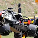 The crashed car of Romain Grosjean (FRA) Haas VF-18 is recovered at Formula One World Championship, Rd5, Spanish Grand Prix, Race, Barcelona, Spain, Sunday 13 May 2018. © Zak Mauger/LAT/Sutton Images