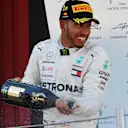 Race winner Lewis Hamilton (GBR) Mercedes-AMG F1 celebrates on the podium with the champagne at Formula One World Championship, Rd5, Spanish Grand Prix, Race, Barcelona, Spain, Sunday 13 May 2018. © Mark Sutton/Sutton Images