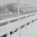 Red Bull Racing mechanic as snow stops testing on day three at Formula One Testing, Day Three, Barcelona, Spain, 28 February 2018. © Mark Sutton/Sutton Images