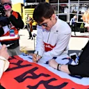 Charles Leclerc (MON) Alfa Romeo Sauber F1 Team signs a flag for fans at Formula One Testing, Day One, Barcelona, Spain, 6 March 2018. © Mark Sutton/Sutton Images