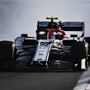 ABU DHABI, UNITED ARAB EMIRATES - NOVEMBER 30: Antonio Giovinazzi of Italy driving the (99) Alfa Romeo Racing C38 Ferrari locks a wheel under braking during final practice for the F1 Grand Prix of Abu Dhabi at Yas Marina Circuit on November 30, 2019 in Abu Dhabi, United Arab Emirates. (Photo by Clive Mason/Getty Images)