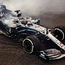 ABU DHABI, UNITED ARAB EMIRATES - DECEMBER 01: Race winner Lewis Hamilton of Great Britain and Mercedes GP celebrates with donuts on track during the F1 Grand Prix of Abu Dhabi at Yas Marina Circuit on December 01, 2019 in Abu Dhabi, United Arab Emirates. (Photo by Mark Thompson/Getty Images)