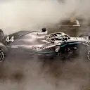 ABU DHABI, UNITED ARAB EMIRATES - DECEMBER 01: Race winner Lewis Hamilton of Great Britain and Mercedes GP celebrates with donuts on track during the F1 Grand Prix of Abu Dhabi at Yas Marina Circuit on December 01, 2019 in Abu Dhabi, United Arab Emirates. (Photo by Mark Thompson/Getty Images)