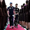 ABU DHABI, UNITED ARAB EMIRATES - DECEMBER 01: Lance Stroll of Canada and Racing Point and Daniel Ricciardo of Australia and Renault Sport F1 walk to the drivers parade before the F1 Grand Prix of Abu Dhabi at Yas Marina Circuit on December 01, 2019 in Abu Dhabi, United Arab Emirates. (Photo by Mark Thompson/Getty Images)