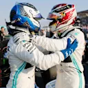 MELBOURNE GRAND PRIX CIRCUIT, AUSTRALIA - MARCH 16: Pole Sitter Lewis Hamilton, Mercedes AMG F1 and Valtteri Bottas, Mercedes AMG F1 in Parc Ferme during the Australian GP at Melbourne Grand Prix Circuit on March 16, 2019 in Melbourne Grand Prix Circuit, Australia. (Photo by Steven Tee / LAT Images)