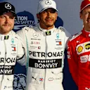 MELBOURNE GRAND PRIX CIRCUIT, AUSTRALIA - MARCH 16: Valtteri Bottas, Mercedes AMG F1, Pole Sitter Lewis Hamilton, Mercedes AMG F1 and Sebastian Vettel, Ferrari in Parc Ferme during the Australian GP at Melbourne Grand Prix Circuit on March 16, 2019 in Melbourne Grand Prix Circuit, Australia. (Photo by Glenn Dunbar / LAT Images)