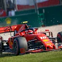 MELBOURNE GRAND PRIX CIRCUIT, AUSTRALIA - MARCH 17: Charles Leclerc, Ferrari SF90 runs wide during the Australian GP at Melbourne Grand Prix Circuit on March 17, 2019 in Melbourne Grand Prix Circuit, Australia. (Photo by Andy Hone / LAT Images)