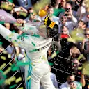 MELBOURNE GRAND PRIX CIRCUIT, AUSTRALIA - MARCH 17: Valtteri Bottas, Mercedes AMG F1, 1st position, celebrates with Champagne on the podium during the Australian GP at Melbourne Grand Prix Circuit on March 17, 2019 in Melbourne Grand Prix Circuit, Australia. (Photo by Steven Tee / LAT Images)
