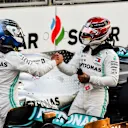 BAKU CITY CIRCUIT, AZERBAIJAN - APRIL 27: Pole Sitter Valtteri Bottas, Mercedes AMG F1 and Lewis Hamilton, Mercedes AMG F1 celebrate in Parc Ferme during the Azerbaijan GP at Baku City Circuit on April 27, 2019 in Baku City Circuit, Azerbaijan. (Photo by Mark Sutton / Sutton Images)