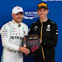 BAKU CITY CIRCUIT, AZERBAIJAN - APRIL 27: Pole man Valtteri Bottas, Mercedes AMG F1, receives his Pirelli Pole Position award from Jack Aitken, Development Driver, Renault F1 during the Azerbaijan GP at Baku City Circuit on April 27, 2019 in Baku City Circuit, Azerbaijan. (Photo by Mark Sutton / Sutton Images)