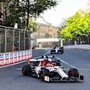 BAKU CITY CIRCUIT, AZERBAIJAN - APRIL 28: Kimi Raikkonen, Alfa Romeo Racing C38, leads George Russell, Williams Racing FW42, Robert Kubica, Williams FW42, and Pierre Gasly, Red Bull Racing RB15 during the Azerbaijan GP at Baku City Circuit on April 28, 2019 in Baku City Circuit, Azerbaijan. (Photo by Simon Galloway / Sutton Images)