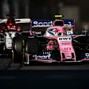 BAKU CITY CIRCUIT, AZERBAIJAN - APRIL 28: Lance Stroll, Racing Point RP19, leads Kimi Raikkonen, Alfa Romeo Racing C38 during the Azerbaijan GP at Baku City Circuit on April 28, 2019 in Baku City Circuit, Azerbaijan. (Photo by Zak Mauger / LAT Images)