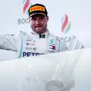 BAKU CITY CIRCUIT, AZERBAIJAN - APRIL 28: Race Winner Valtteri Bottas, Mercedes AMG F1 celebrates on the podium with the trophy and with the champagne during the Azerbaijan GP at Baku City Circuit on April 28, 2019 in Baku City Circuit, Azerbaijan. (Photo by Andy Hone / LAT Images)