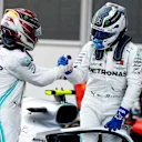 BAKU CITY CIRCUIT, AZERBAIJAN - APRIL 28: Lewis Hamilton, Mercedes AMG F1 and Valtteri Bottas, Mercedes AMG F1 celebrate in Parc Ferme during the Azerbaijan GP at Baku City Circuit on April 28, 2019 in Baku City Circuit, Azerbaijan. (Photo by Glenn Dunbar / LAT Images)