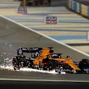 BAHRAIN INTERNATIONAL CIRCUIT, BAHRAIN - MARCH 31: Carlos Sainz, McLaren MCL34 with damage during the Bahrain GP at Bahrain International Circuit on March 31, 2019 in Bahrain International Circuit, Bahrain. (Photo by Zak Mauger / LAT Images)