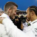 BAHRAIN INTERNATIONAL CIRCUIT, BAHRAIN - MARCH 31: David Beckham meets Lewis Hamilton, Mercedes AMG F1, on the grid during the Bahrain GP at Bahrain International Circuit on March 31, 2019 in Bahrain International Circuit, Bahrain. (Photo by Zak Mauger / LAT Images)