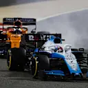 BAHRAIN INTERNATIONAL CIRCUIT, BAHRAIN - MARCH 31: George Russell, Williams Racing FW42, leads Carlos Sainz Jr., McLaren MCL34 during the Bahrain GP at Bahrain International Circuit on March 31, 2019 in Bahrain International Circuit, Bahrain. (Photo by Glenn Dunbar / LAT Images)