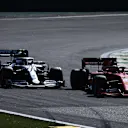 SAO PAULO, BRAZIL - NOVEMBER 17: Charles Leclerc of Monaco driving the (16) Scuderia Ferrari SF90 leads Valtteri Bottas driving the (77) Mercedes AMG Petronas F1 Team Mercedes W10 on track during the F1 Grand Prix of Brazil at Autodromo Jose Carlos Pace on November 17, 2019 in Sao Paulo, Brazil. (Photo by Charles Coates/Getty Images)