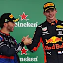 SAO PAULO, BRAZIL - NOVEMBER 17: Race winner Max Verstappen of Netherlands and Red Bull Racing and second placed Pierre Gasly of France and Scuderia Toro Rosso celebrate on the podium during the F1 Grand Prix of Brazil at Autodromo Jose Carlos Pace on November 17, 2019 in Sao Paulo, Brazil. (Photo by Mark Thompson/Getty Images)