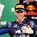 SAO PAULO, BRAZIL - NOVEMBER 17: Second placed Pierre Gasly of France and Scuderia Toro Rosso celebrates on the podium during the F1 Grand Prix of Brazil at Autodromo Jose Carlos Pace on November 17, 2019 in Sao Paulo, Brazil. (Photo by Mark Thompson/Getty Images)