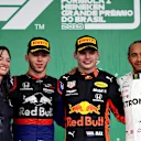 SAO PAULO, BRAZIL - NOVEMBER 17: Top three finishers Max Verstappen of Netherlands and Red Bull Racing, Pierre Gasly of France and Scuderia Toro Rosso and Lewis Hamilton of Great Britain and Mercedes GP celebrate on the podium during the F1 Grand Prix of Brazil at Autodromo Jose Carlos Pace on November 17, 2019 in Sao Paulo, Brazil. (Photo by Mark Thompson/Getty Images)