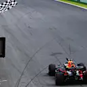 SAO PAULO, BRAZIL - NOVEMBER 17: Race winner Max Verstappen of the Netherlands driving the (33) Aston Martin Red Bull Racing RB15 takes the chequered flag during the F1 Grand Prix of Brazil at Autodromo Jose Carlos Pace on November 17, 2019 in Sao Paulo, Brazil. (Photo by Mark Thompson/Getty Images)