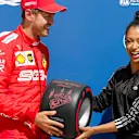 CIRCUIT GILLES-VILLENEUVE, CANADA - JUNE 08: Sebastian Vettel, Ferrari, is presented with his Pirelli Pole Position Award by actress Liza Koshy during the Canadian GP at Circuit Gilles-Villeneuve on June 08, 2019 in Circuit Gilles-Villeneuve, Canada. (Photo by Steven Tee / LAT Images)