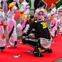 SHANGHAI INTERNATIONAL CIRCUIT, CHINA - APRIL 14: Daniel Ricciardo, Renault, on the grid with the Grid Kid mascots during the Chinese GP at Shanghai International Circuit on April 14, 2019 in Shanghai International Circuit, China. (Photo by Mark Sutton / Sutton Images)