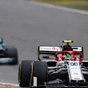 SHANGHAI INTERNATIONAL CIRCUIT, CHINA - APRIL 14: Antonio Giovinazzi, Alfa Romeo Racing C38, leads Valtteri Bottas, Mercedes AMG W10 during the Chinese GP at Shanghai International Circuit on April 14, 2019 in Shanghai International Circuit, China. (Photo by Glenn Dunbar / LAT Images)