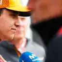 SHANGHAI INTERNATIONAL CIRCUIT, CHINA - APRIL 12: Lando Norris, McLaren, is interviewed during the Chinese GP at Shanghai International Circuit on April 12, 2019 in Shanghai International Circuit, China. (Photo by Andy Hone / LAT Images)