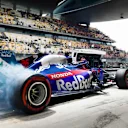 SHANGHAI INTERNATIONAL CIRCUIT, CHINA - APRIL 13: Daniil Kvyat, Toro Rosso STR14, lights up his rears in the pit lane during the Chinese GP at Shanghai International Circuit on April 13, 2019 in Shanghai International Circuit, China. (Photo by Andy Hone / LAT Images)
