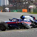 SHANGHAI INTERNATIONAL CIRCUIT, CHINA - APRIL 13: Alexander Albon, Toro Rosso STR14, comes to a halt after losing control and hitting a barrier towards the end of practice 3 during the Chinese GP at Shanghai International Circuit on April 13, 2019 in Shanghai International Circuit, China. (Photo by Steve Etherington / LAT Images)