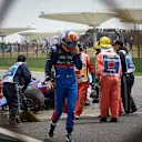 SHANGHAI INTERNATIONAL CIRCUIT, CHINA - APRIL 13: Alexander Albon, Toro Rosso, walks away from his car after losing control and hitting a barrier towards the end of practice 3 during the Chinese GP at Shanghai International Circuit on April 13, 2019 in Shanghai International Circuit, China. (Photo by Steve Etherington / LAT Images)