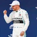 SHANGHAI INTERNATIONAL CIRCUIT, CHINA - APRIL 13: Valtteri Bottas, Mercedes AMG F1 celebrates pole position in Parc Ferme during the Chinese GP at Shanghai International Circuit on April 13, 2019 in Shanghai International Circuit, China. (Photo by Glenn Dunbar / LAT Images)
