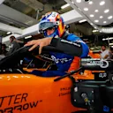 SHANGHAI INTERNATIONAL CIRCUIT, CHINA - APRIL 13: Carlos Sainz, McLaren, climbs into his car during the Chinese GP at Shanghai International Circuit on April 13, 2019 in Shanghai International Circuit, China. (Photo by Steven Tee / LAT Images)