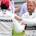 SHANGHAI INTERNATIONAL CIRCUIT, CHINA - APRIL 13: Lewis Hamilton, Mercedes AMG F1, and pole man Valtteri Bottas, Mercedes AMG F1, congratulate each other after Qualifying during the Chinese GP at Shanghai International Circuit on April 13, 2019 in Shanghai International Circuit, China. (Photo by Mark Sutton / Sutton Images)