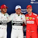 SHANGHAI INTERNATIONAL CIRCUIT, CHINA - APRIL 13: Top three Qualifiers Lewis Hamilton, Mercedes AMG F1, pole man Valtteri Bottas, Mercedes AMG F1, and Sebastian Vettel, Ferrari during the Chinese GP at Shanghai International Circuit on April 13, 2019 in Shanghai International Circuit, China. (Photo by Mark Sutton / Sutton Images)