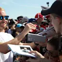 CIRCUIT PAUL RICARD, FRANCE - JUNE 20: Valtteri Bottas, Mercedes AMG F1, meets fans for pictures and autographs during the French GP at Circuit Paul Ricard on June 20, 2019 in Circuit Paul Ricard, France. (Photo by Steve Etherington / LAT Images)