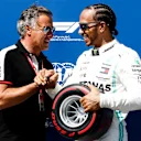 CIRCUIT PAUL RICARD, FRANCE - JUNE 22: Jean Alesi presents Lewis Hamilton, Mercedes AMG F1, with his Pirelli Pole Position award during the French GP at Circuit Paul Ricard on June 22, 2019 in Circuit Paul Ricard, France. (Photo by Glenn Dunbar / LAT Images)