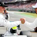HOCKENHEIMRING, GERMANY - JULY 27: Valtteri Bottas, Mercedes AMG W10 and Pole Sitter Lewis Hamilton, Mercedes AMG F1 celebrate in Parc Ferme during the German GP at Hockenheimring on July 27, 2019 in Hockenheimring, Germany. (Photo by Steven Tee / LAT Images)