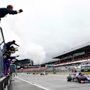HOCKENHEIMRING, GERMANY - JULY 28: The Toro Rosso team cheer as Daniil Kvyat, Toro Rosso STR14, 3rd position, crosses the line during the German GP at Hockenheimring on July 28, 2019 in Hockenheimring, Germany. (Photo by Andy Hone / LAT Images)