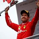 HOCKENHEIMRING, GERMANY - JULY 28: Sebastian Vettel, Ferrari, 2nd position, on the podium with his trophy during the German GP at Hockenheimring on July 28, 2019 in Hockenheimring, Germany. (Photo by Andy Hone / LAT Images)