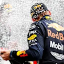 HOCKENHEIMRING, GERMANY - JULY 28: Max Verstappen, Red Bull Racing, 1st position, sprays Champagne on the podium during the German GP at Hockenheimring on July 28, 2019 in Hockenheimring, Germany. (Photo by Steven Tee / LAT Images)