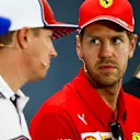 HOCKENHEIMRING, GERMANY - JULY 25: Sebastian Vettel, Ferrari and Kimi Raikkonen, Alfa Romeo Racing talk in the Press Conference during the German GP at Hockenheimring on July 25, 2019 in Hockenheimring, Germany. (Photo by Andy Hone / LAT Images)