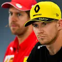 HOCKENHEIMRING, GERMANY - JULY 25: Nico Hulkenberg, Renault F1 Team and Sebastian Vettel, Ferrari In the Press Conference during the German GP at Hockenheimring on July 25, 2019 in Hockenheimring, Germany. (Photo by Mark Sutton / Sutton Images)
