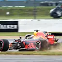 SILVERSTONE, UNITED KINGDOM - JULY 13: Max Verstappen, Red Bull Racing RB15, takes to the grass during the British GP at Silverstone on July 13, 2019 in Silverstone, United Kingdom. (Photo by Gareth Harford / Sutton Images)