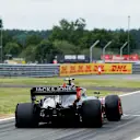 SILVERSTONE, UNITED KINGDOM - JULY 14: Kevin Magnussen, Haas VF-19, heads int the pits with a rear puncture during the British GP at Silverstone on July 14, 2019 in Silverstone, United Kingdom. (Photo by Zak Mauger / LAT Images)