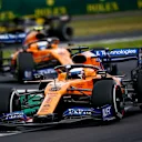 SILVERSTONE, UNITED KINGDOM - JULY 14: Carlos Sainz, McLaren MCL34, leads Lando Norris, McLaren MCL34 during the British GP at Silverstone on July 14, 2019 in Silverstone, United Kingdom. (Photo by Andy Hone / LAT Images)