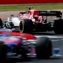SILVERSTONE, UNITED KINGDOM - JULY 14: Kimi Raikkonen, Alfa Romeo Racing C38, leads Lance Stroll, Racing Point RP19 during the British GP at Silverstone on July 14, 2019 in Silverstone, United Kingdom. (Photo by Zak Mauger / LAT Images)