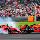 SILVERSTONE, UNITED KINGDOM - JULY 14: Sebastian Vettel, Ferrari SF90 running into the back of Max Verstappen, Red Bull Racing RB15 during the British GP at Silverstone on July 14, 2019 in Silverstone, United Kingdom. (Photo by Hasan Bratic / LAT Images)